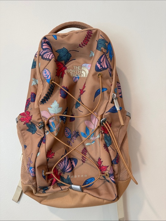 The North Face Handbags - The North Face Floral Tan Jester Backpack with Leaves Butterfly